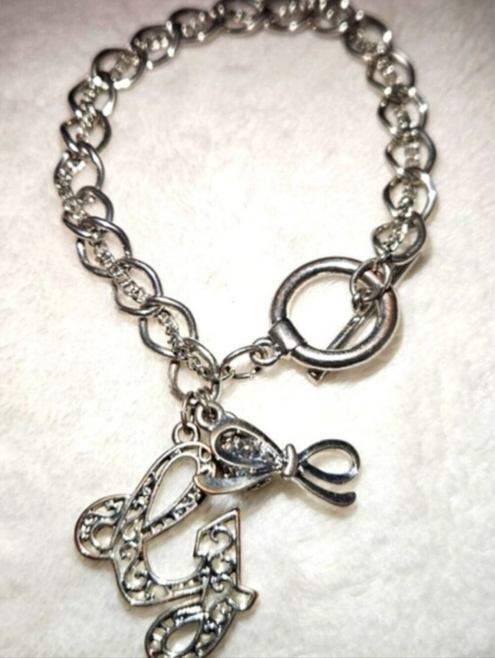 G by Guess 80's Silver-Tone Charm Bracelet with 'G' Initial Bow & Crystal Accent - Picture 3 of 4